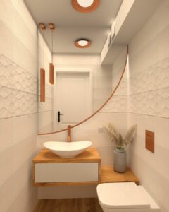 Przytulna sypialnia i łazienka na poddaszu zaprojektowana przez Wnętrza z duszą